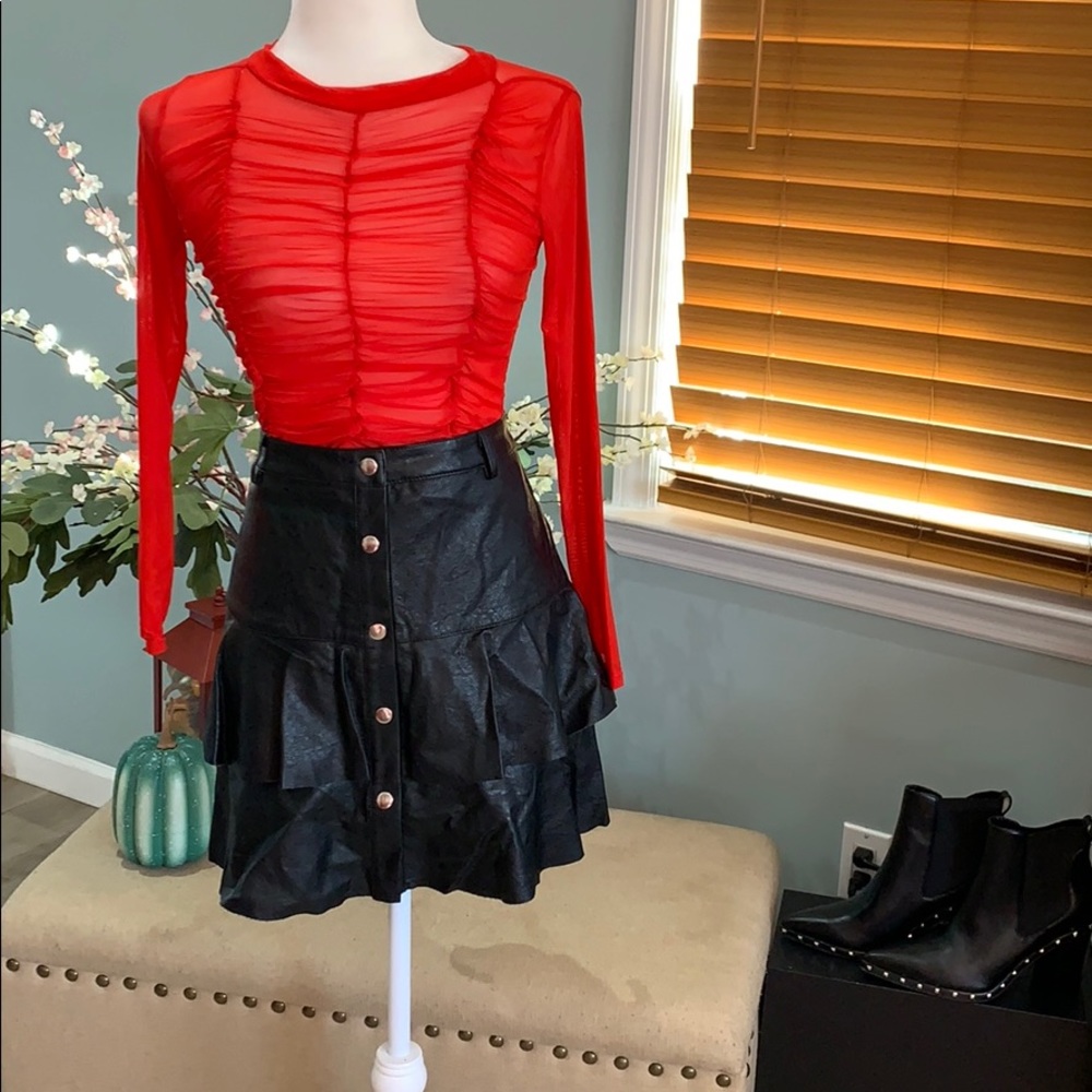 Brand new pleather skirt with a see through shirt